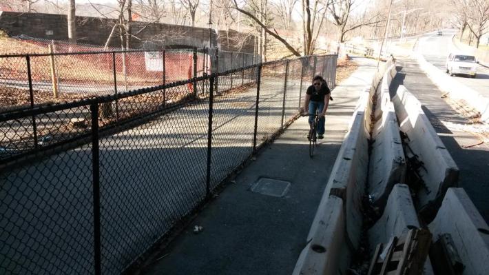 There's about as much space dedicated to storing Jersey barriers as there is to the safe passage of cyclists and pedestrians. Photo: Urban Residue/Twitter